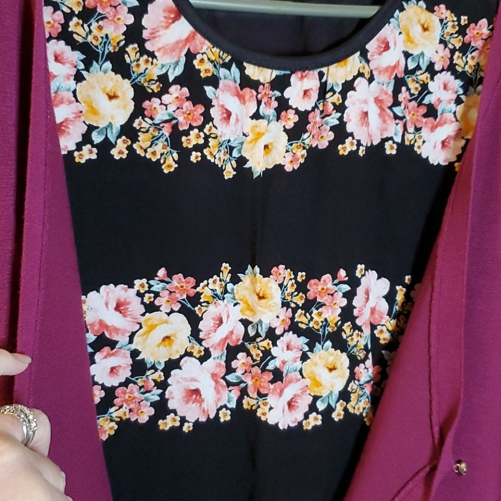 A beautiful sweater with sheer layered shirt